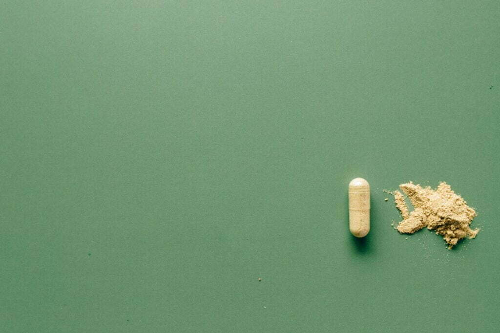 medication pill on green background